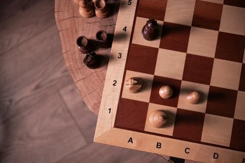 Chess board on a table Stock Photos