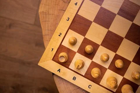 Chess board on a table Stock Photos