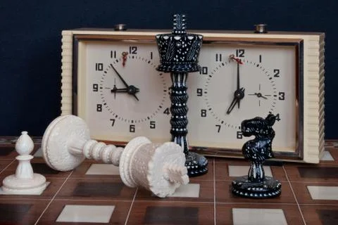 Chess with clock. Stock Photos