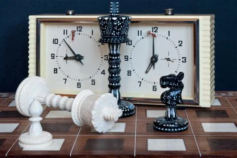 Chess with clock. Stock Photos