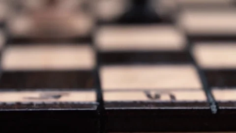 Chess closeup, wooden chess board, business concept, black background. slide Stock-Footage 72829009