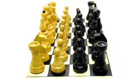 Chess confrontation on a light background Stock Photos
