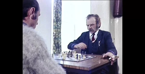Chess Enthusiasts: Men Playing Chess - 1981 Stock Footage 261142704
