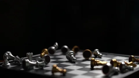 Chess falling on chess board loser concept Slow motion Stock Footage 106800168
