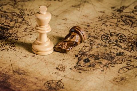 Chess figure on map background concept for ideas Stock Photos