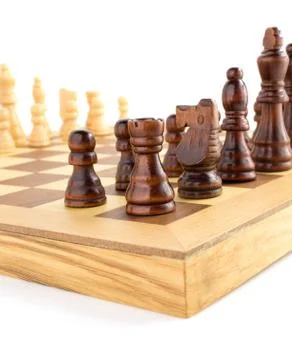 Chess figures on board at white Stock Photos
