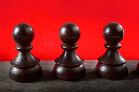 Chess Figures on Color Background Stock Photos
