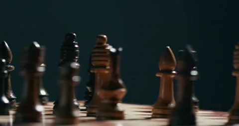 Chess figures spread on the chess board 4K video Stock Footage 131002369