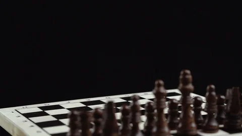 Chess game on black background close up Stock Footage 98654504