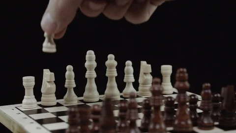 Chess game on black background close up Stock Footage 98655060