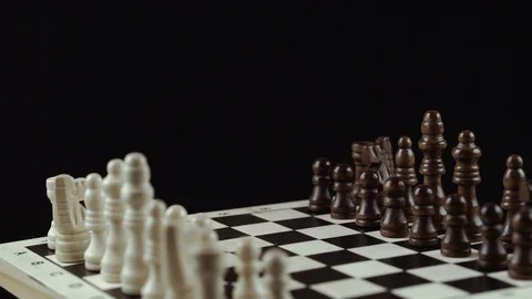 Chess game on black background close up Stock Footage 98655201
