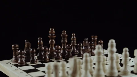 Chess game on black background close up Stock Footage 98656240