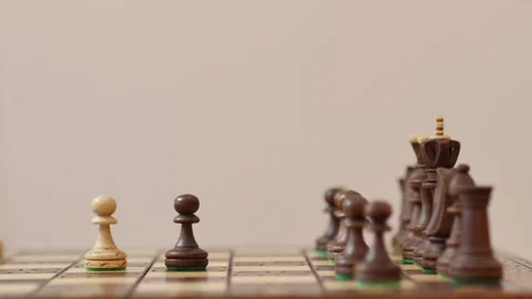 Chess game: black defending by pushing pawn. chess game. Business, competition, Video stock 146241158