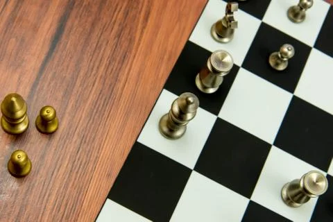 Chess game - captured pieces on side of the chessboard Stock Photos