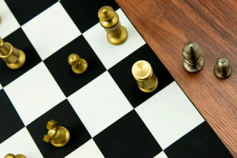 Chess game - captured pieces on side of the chessboard Stock Photos