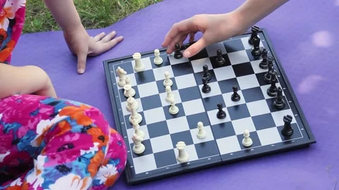 Chess game close-up outdoors in a park Video stock 133196845