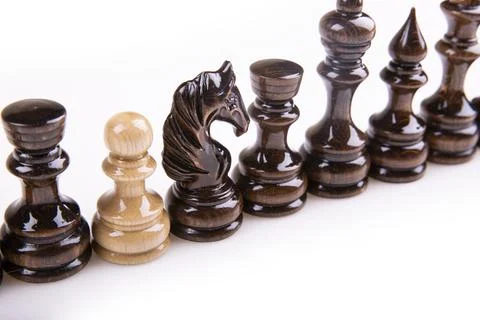 Chess game figures on white background Foto stock