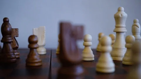 Chess Game Pieces L to R Pan Gameplay Closeup Video stock 124337147