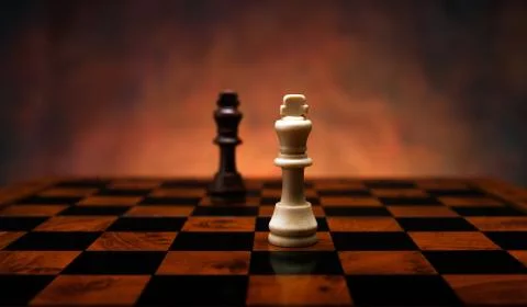 Chess game with pieces on the table 库存照片