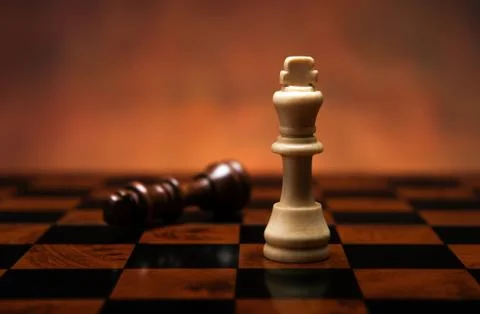 Chess game with pieces on the table Stock Photos