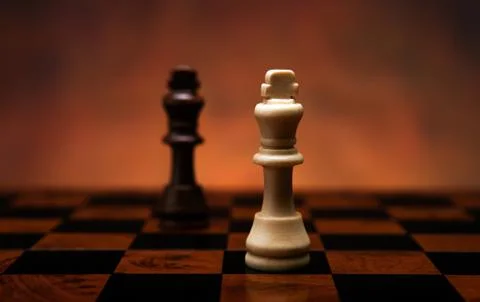 Chess game with pieces on the table Stock Photos