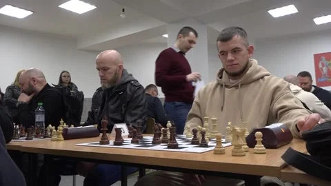 Chess Game – Player Struggles to Make a Move. Medium Shot Stock Footage 332161233
