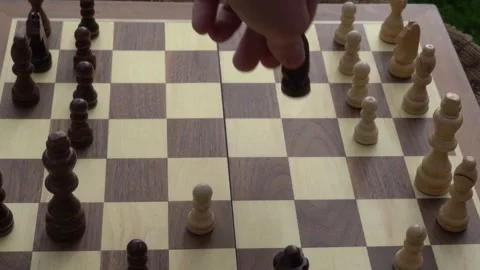 Chess game, playing chess, intelligence, board game, outdoors, recreation Stock Footage 262680442