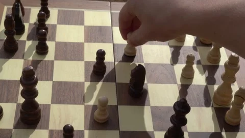 Chess game, playing chess, intelligence, board game, outdoors, recreation Stock Footage 262680514