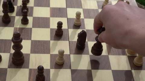 Chess game, playing chess, intelligence, board game, outdoors, recreation Stock Footage 262680579