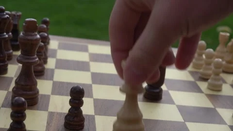 Chess game, playing chess, intelligence, board game, outdoors, recreation Stock Footage 262680637