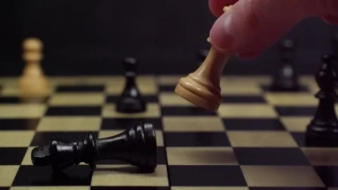 Chess game queen beats king Stock Footage 170790429
