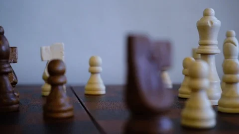 Chess Game R to L Pan of Pieces in play Closeup Gameplay Video stock 124338226