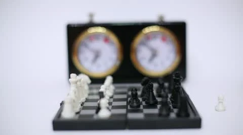 Chess game with unfocused time clock isolated Stock Footage 22011058