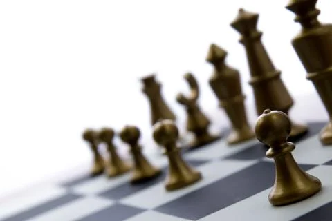 Chess game - view of playing pieces on chessboard Stock Photos