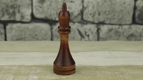 Chess king on a brick background Stock Footage 78333169