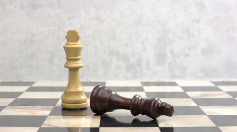 Chess king falling down, beaten by opponent Stock Footage 63547436