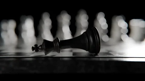 Chess King Piece Lying Fallen on a Marble Checkered Game Board 库存影片 331109942