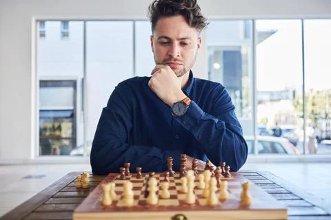 Chess, man and thinking of strategy in game, problem solving or person playing Stock Photos