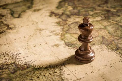 Chess on old map  Stock Photos