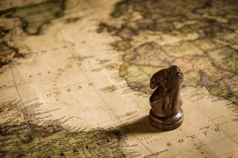 Chess on old map  Stock Photos