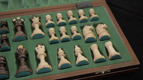 Chess. Open box with chess pieces. Panorama in motion. Stock Footage 40586143