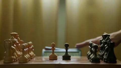 Chess Opening with First Captures and Chess Clock on Wooden Board Close Up Видео 346105628