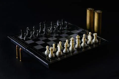 Chess or  weapon war game Stock Photos