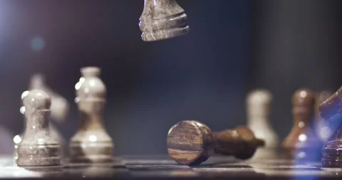 Chess Piece Capture in Slow Motion with Falling Chess Piece Stock Footage 338141968