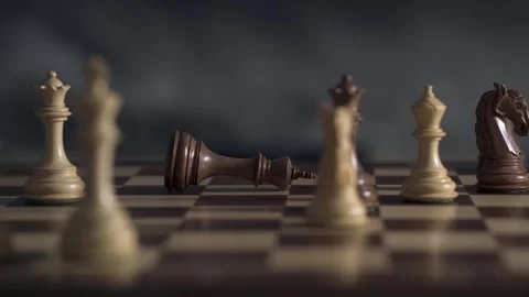 Chess pieces are located on a chessboard Stock Footage 323711468