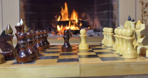 Chess pieces on the background of the fireplace. Vídeos de archivo 110692188