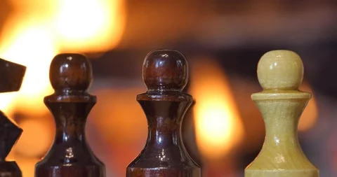 Chess pieces on the background of the fireplace. Stock-Footage 110692249