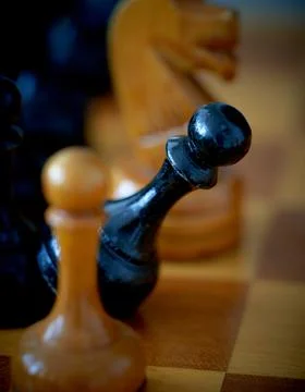 Chess pieces on a board, close-up. Selective focus. Stock Photos