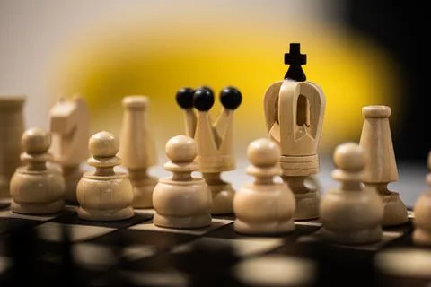Chess pieces on board in incorrect initial position. king is not in his cell Stock Photos