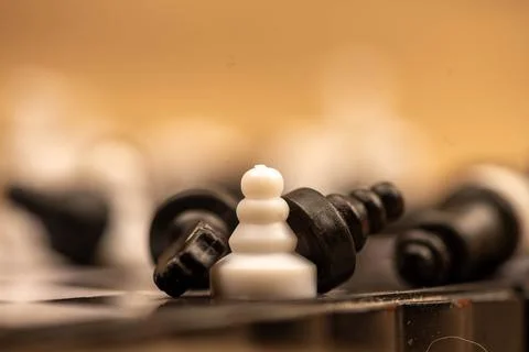 Chess pieces on a chessboard. Close-up, selective focus Stock Photos